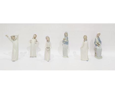 Lladro model of a girl holding lilies, 23cm high, another Lladro figure of a seated girl holding lilies and four Lladro figur