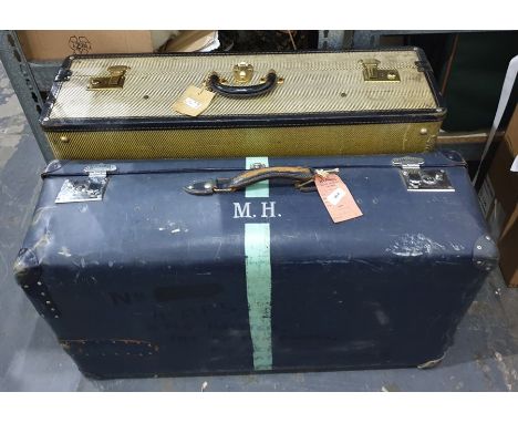 Large vintage travelling trunk and another containing assorted table and other linen (2) 