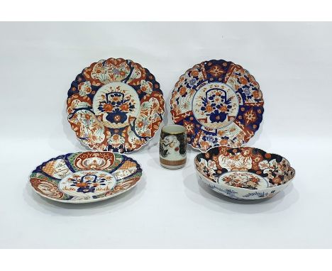 Japanese Imari porcelain bowl, shallow and lobed with panels of flowers in typical colours, 27cm diameter, three similar Japa