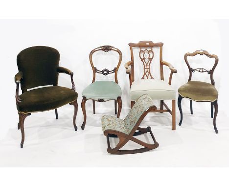 Early 20th century mahogany carver chair in the Georgian manner, a 19th century mahogany salon chair with carved hand rests o