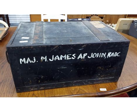 Military wood and metal bound small trunk, labelled 'On Her Majesty's Service to Supply and Transport Officer Royal Naval Dep