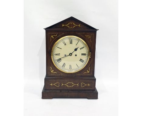 19th century mahogany and brass inlaid chiming bracket clock, the arched top above the circular dial with Roman numerals, the