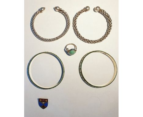 Two silver bangles, two other items and a pair of silver and enamel bangles (6)