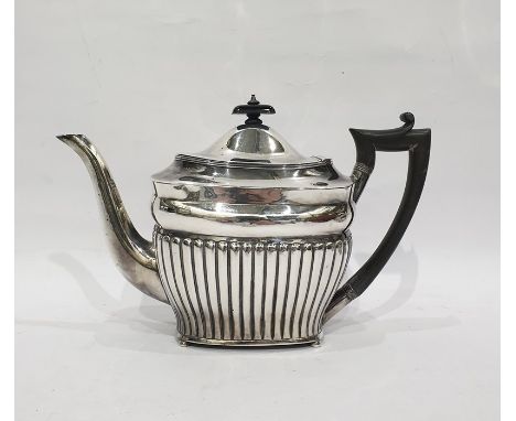 George III silver teapot, maker's mark 'I.B' (possibly Joseph Biggs), London 1804, of half-fluted oblong form, on four bun fe