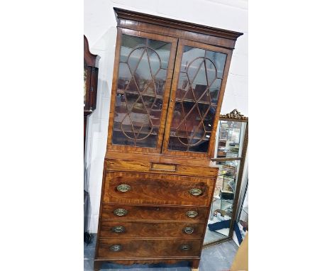 George III inlaid mahogany secretaire bookcase, the top section with line inlaid frieze, three shelves enclosed by astragal g