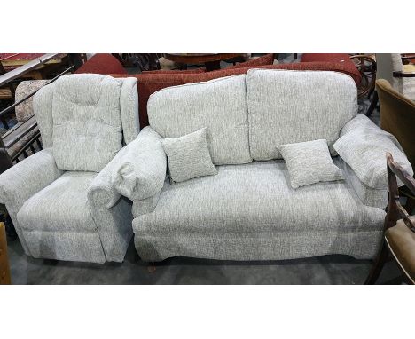 Two seater sofa and single armchair in a light grey upholstery 