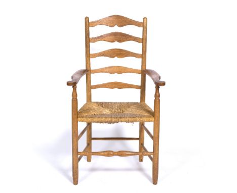Neville Neal Oak ladder back armchair, with rush seats and turned legs, 109cm high x 58cm wide
