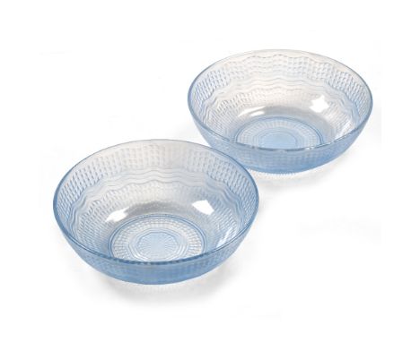 A pair of vintage blue glass bowls each 24cm across 