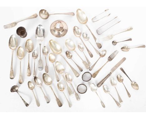 A quantity of mixed silver flatware, various dates and makers including Georgian bright-cut sugar nips, sauce ladle and spoon