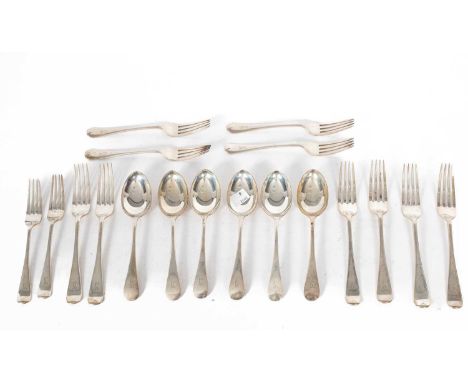 A set of six old English pattern silver dessert spoons and forks, William Hair Haseler, Birmingham 1929, and a closely matche