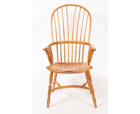 Robin Clarke (Contemporary) An ash Windsor chair with hoop stick back above a shaped seat, on turned splayed legs joined by a