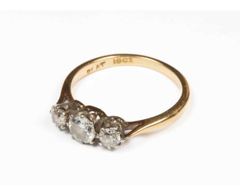 An 18ct yellow gold and diamond three-stone ring, estimated total diamond weight approximately 0.5ct, ring size K½, gross wei