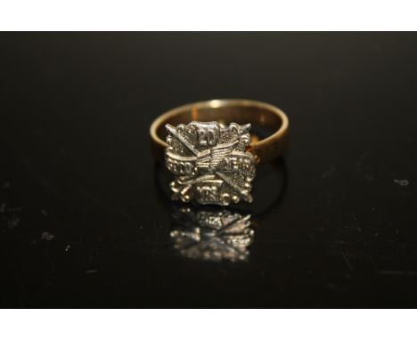 A HALLMARKED 9 CARAT GOLD AND SILVER GOODYEAR 20 YEARS RING