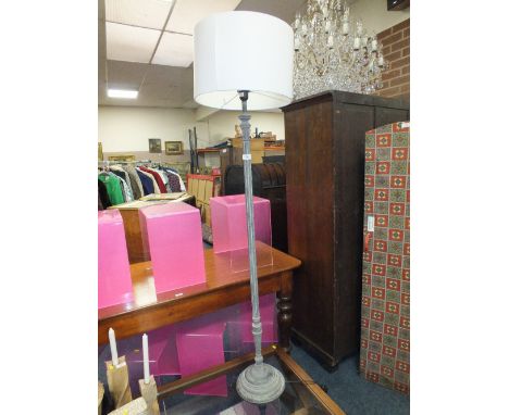 A LIMED MODERN STANDARD LAMP