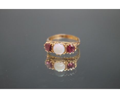 A HALLMARKED 9 CARAT GOLD THREE STONE OPAL AND RUBY RING, approx weight 3.2g, ring size M