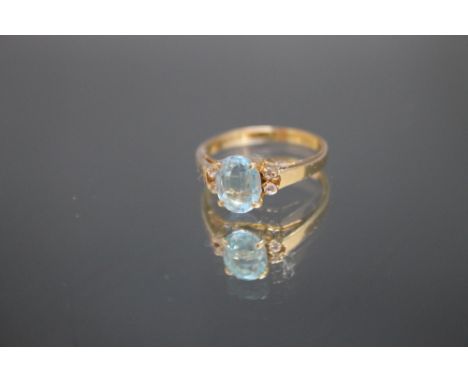 A 14K BLUE TOPAZ RING,  approx weight 2.4g, ring size M 1/2