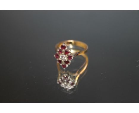 A HALLMARKED 18 CARAT GOLD RING, set with ruby and diamond style stones, approx weight 4.1g, ring size K 1/2