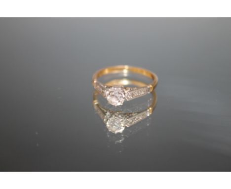 AN 18CT GOLD DIAMOND SOLITAIRE RING, the brilliant cut diamond being an estimated half a carat, ring size M