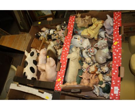 TWO TRAYS OF ASSORTED CERAMIC AND RESIN PIG FIGURES, PIGGY BANKS ETC