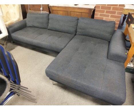 A MODERN UPHOLSTERED CORNER SOFA