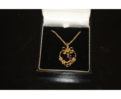 A SILVER GILT ART NOUVEAU STYLE PENDANT ON CHAIN