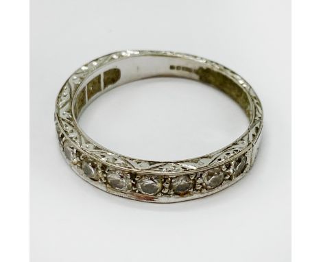 18CT WHITE GOLD HALF ETERNITY RING SIZE R/S - 4.8 GRAMS APPROX INC. STONES