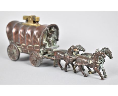 A Novelty Bronze Effect Lighter In the Form of an American Covered Wagon Pulled by Four Horses, 18cm Long (We are Unable to P