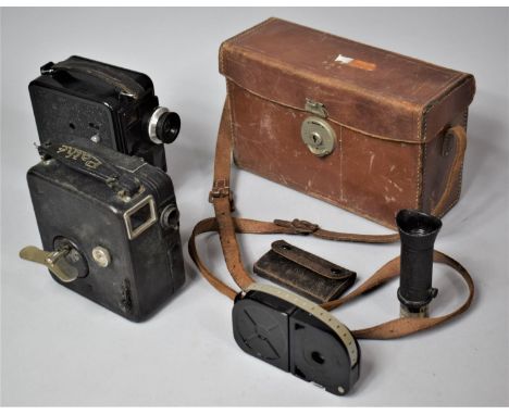 A Pathe Baby Cine Camera Complete with Additional Lens etc and Fitted Leather Case Together with a Dekko Clock work 8mm Cine 