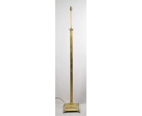 A Brass Standard Lamp in the Form of Ribbed Corinthian Column on Stepped Square Base with Four Scrolled Feet 