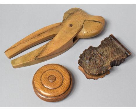 A Carved Wooden Pocket Watch Holder (AF) Together with a Carved Nutcracker and a Circular Wooden Box Containing Inset Victori