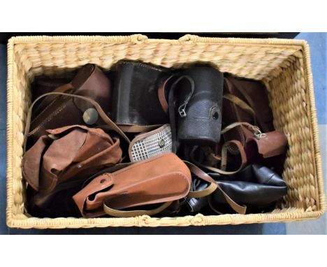 A Wicker Basket Containing Various Vintage Camera Cases 