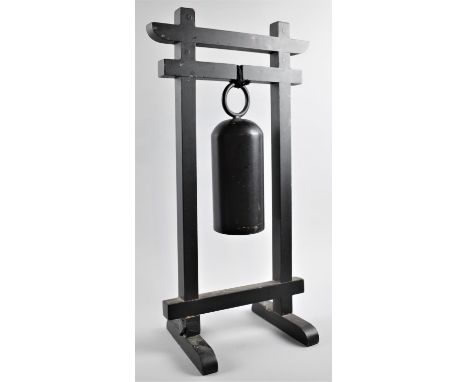 A Reproduction Oriental Gong on Stand, 53.5cm high 