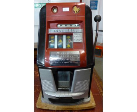 An Art Deco Sega Bell coin operated one arm bandit slot machine (working)