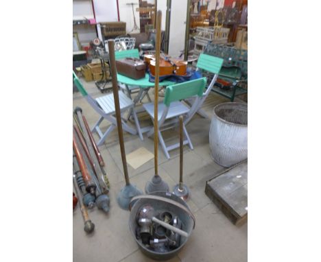 Four vintage ponches, irons, etc.