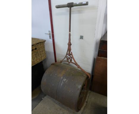 A large Victorian cast iron garden roller