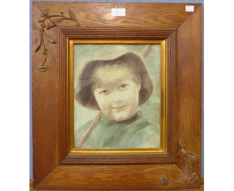 English School, portrait of a smiling boy, 29 x 24cms, framed