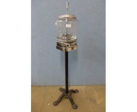 A vintage coin operated Beaver sweet machine