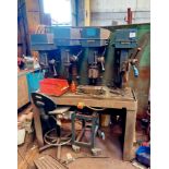 Meddings bank of four drills with workbench