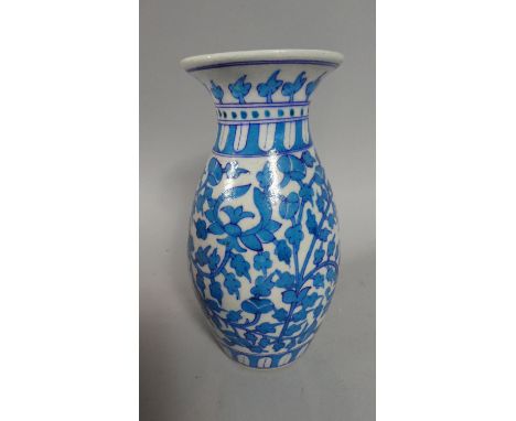 A Indian Blue and White Ceramic Vase Decorated With Blue Enamelled Floral Sprays, 23cm Tall