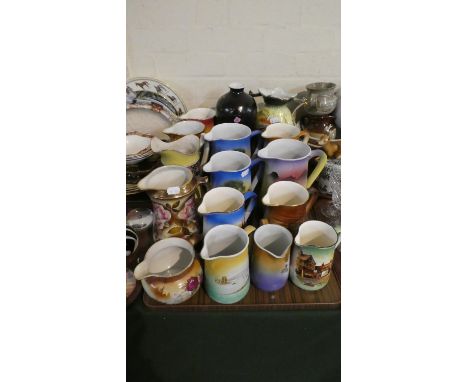 A Large Collection of Various Painted and Transfer Printed Ceramic Water Jugs, Vase etc 