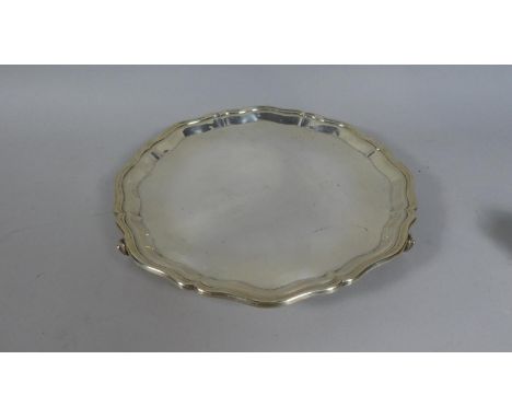 A Circular Silver Salver with Chippendale Style Border Set on Three Scrolled Feet, 32cm Diameter