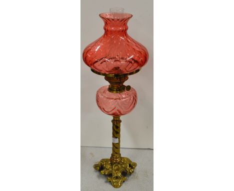EDWARDIAN DOUBLE BURNER PARAFFIN LAMP WITH BRASS TWIST COLUMN STAND, RUBY GLASS SHADE &amp; RUBY GLASS RESERVOIR WITH GLASS F