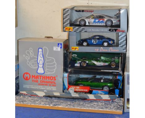 4 VARIOUS BOXED MODEL VEHICLES, LAVA LAMP IN BOX &amp; MODEL WAR SHIP ON STAND     