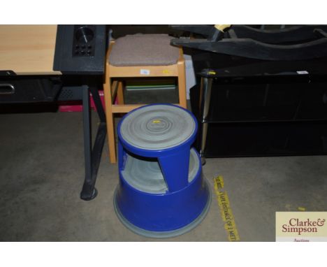 A circular moveable step and a small stool