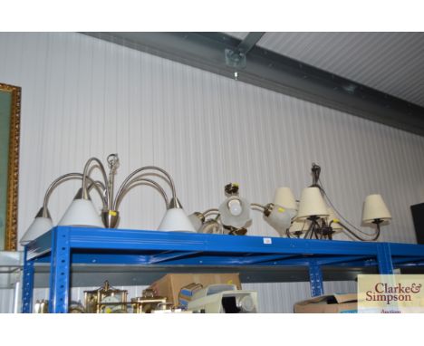 Three modern hanging light fittings
