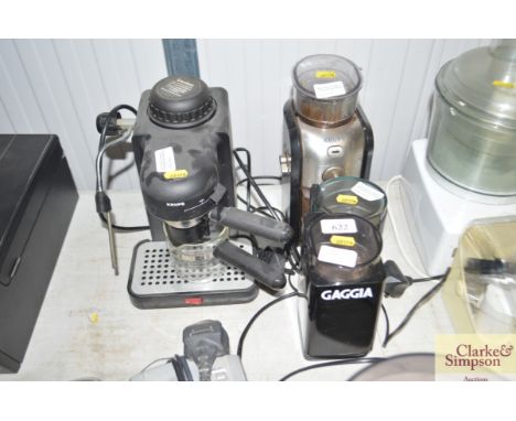 A Krups coffee machine; Krups coffee grinder and two other small coffee grinders