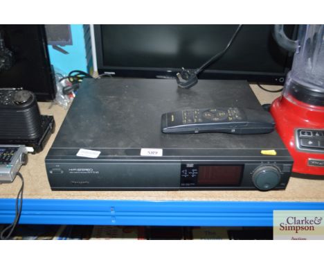 A Panasonic video cassette recorder, with remote control