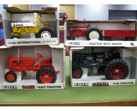 Four Ertl Predominately 1/16th Scale Diecast Model Tractors, #653 International Cub Tractor, #52 International Tractor with W