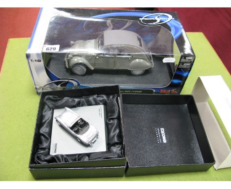 A Maisto 1:18th Scale Diecast Model #16954-2 Citroen 2 CV (1952), Corgi Precision Cast Austin Healey 3000 MKII, both boxed.