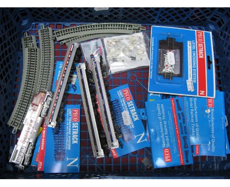 A Kato 'N' Gauge Outline American Diesel Locomotive, R/No. 605, red and silver livery, three 'N' gauge Bachmann 'Amtrak' live